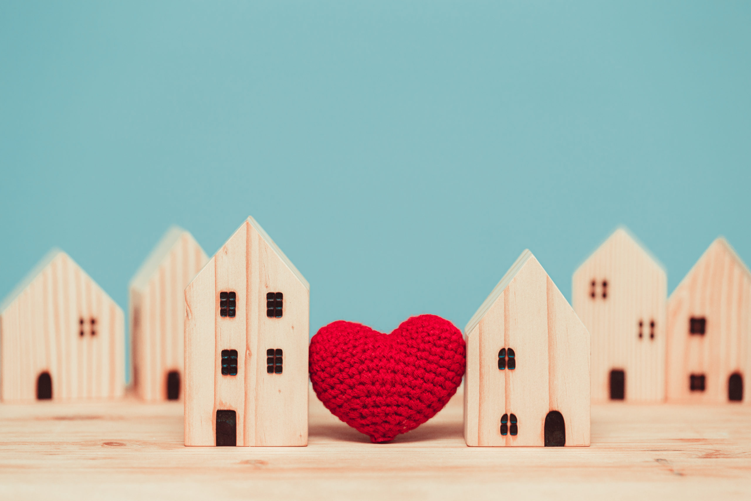 little wooden houses with a heart in the middle