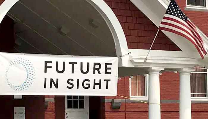future in sight banner hung on the entrance of a building