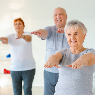 older adults doing a workout class