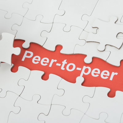 puzzle pieces together that read peer-to-peer