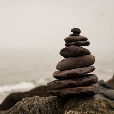 thin rocks placed on top of each other, creating a sculpture