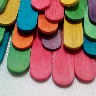 colorful popsicle sticks on a table