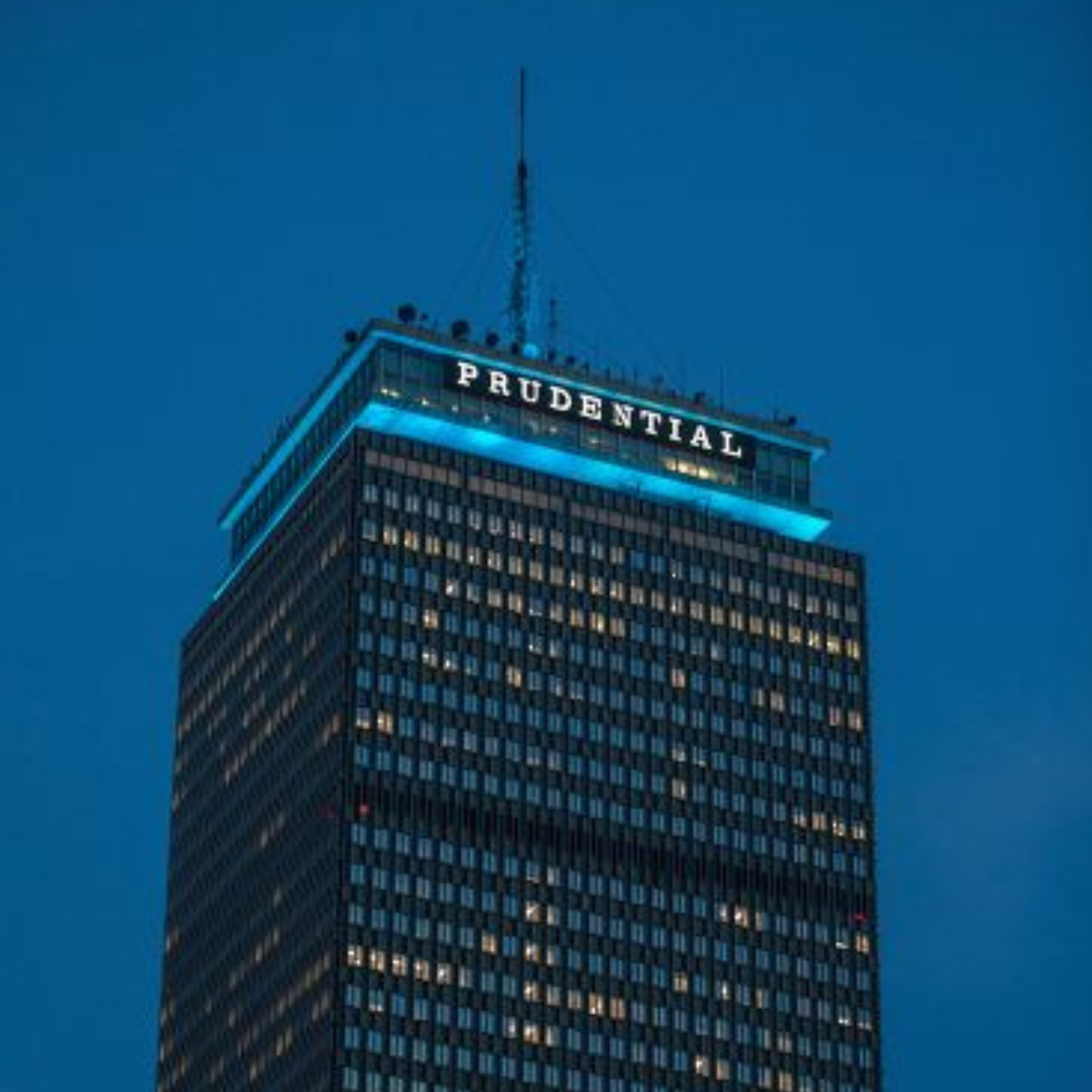 Prudential Tower lit up in teal