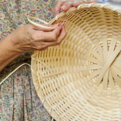 person making a basket