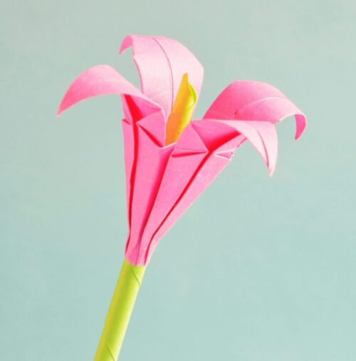 A colorful flower made from origami.