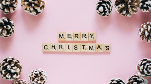 Merry Christmas spelled out it game tiles.