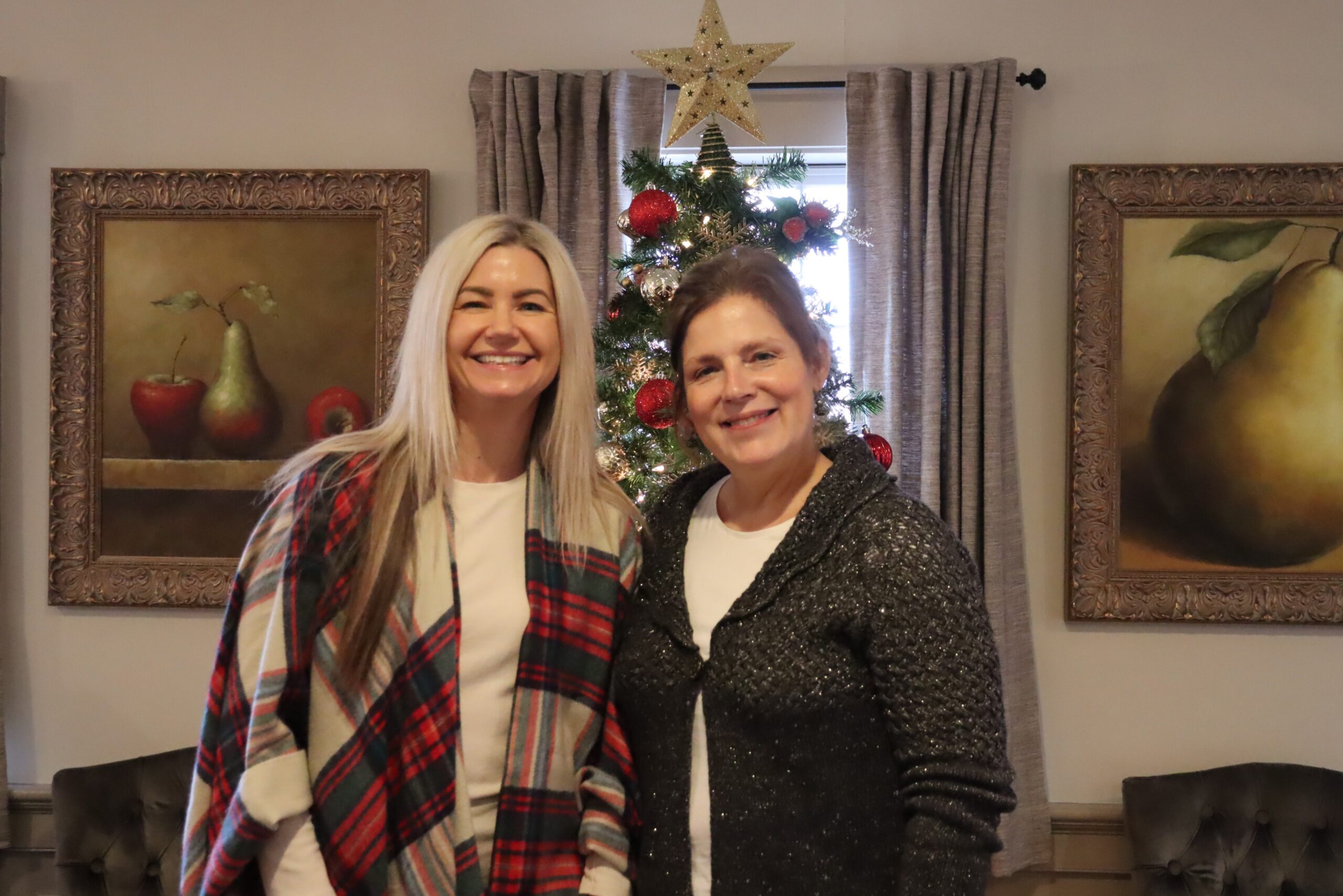 Courtney and Nathalie with the Christmas tree.
