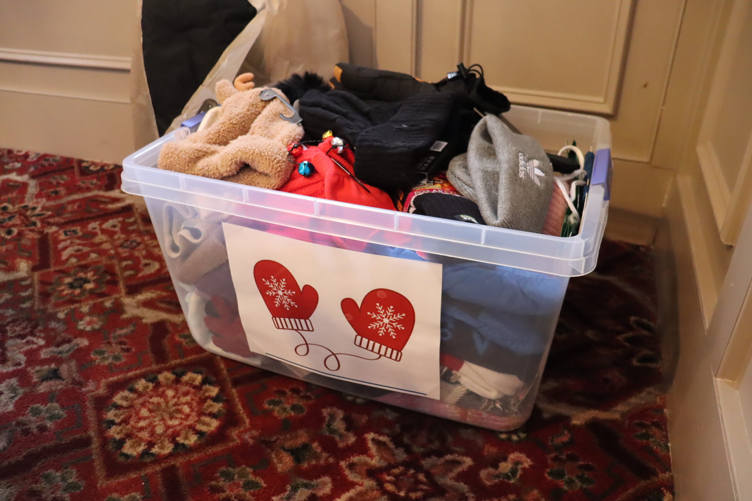 The bin full of donations.