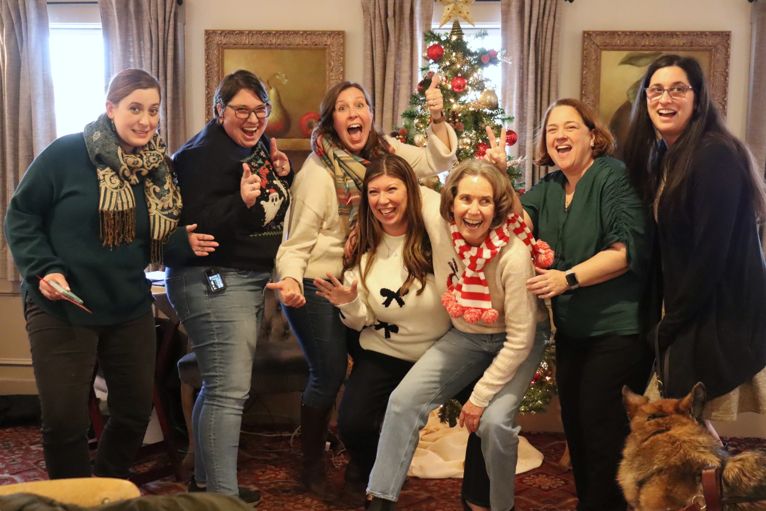 Members of the Youth Services team making funny faces and poses.