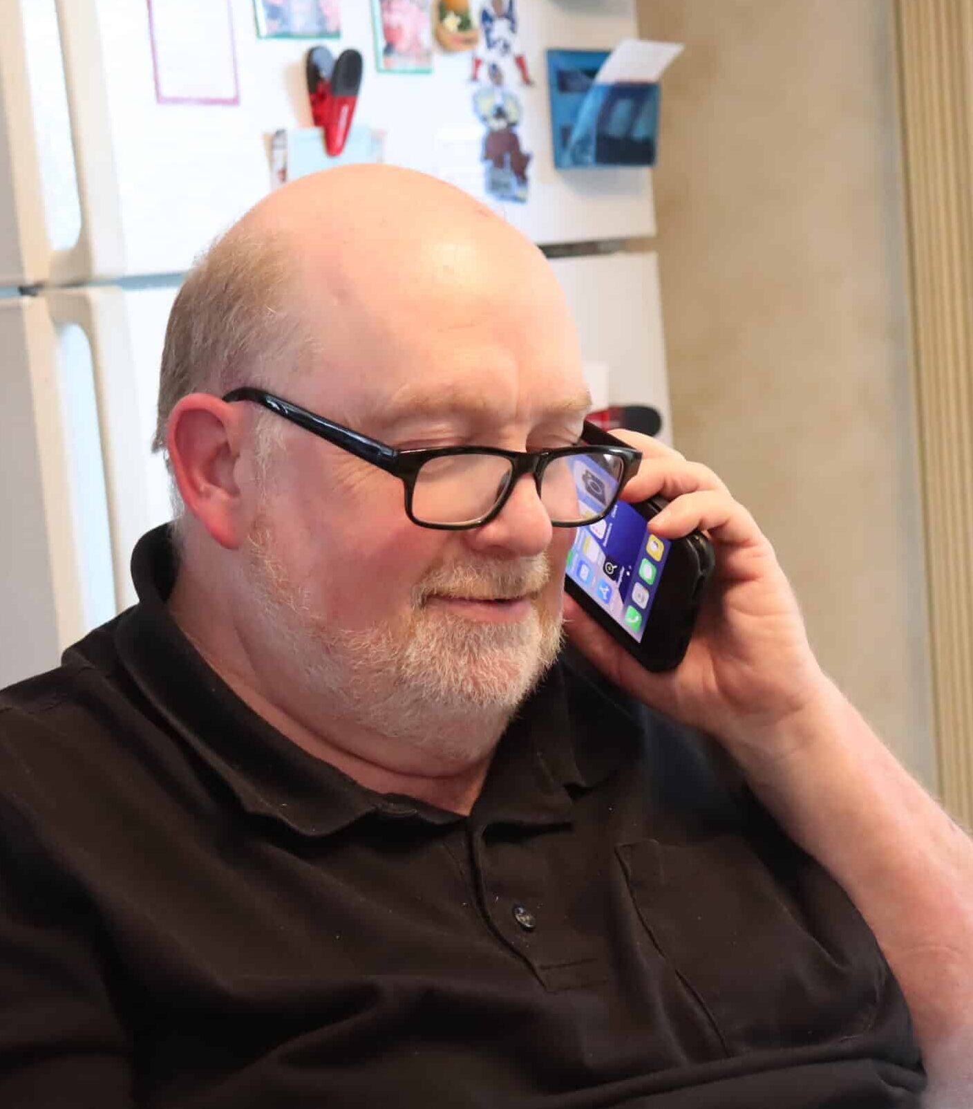 A senior speaking on a TEAP iPhone.