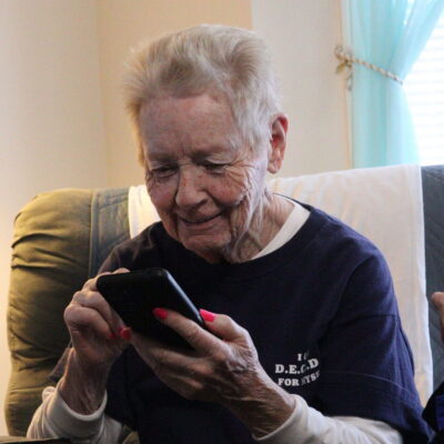 A senior using a smartphone.